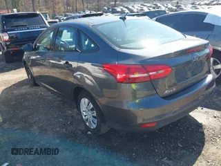 2017 Ford Focus S z VIN 1FADP3E29HL269607, wystawiony jako IAAI lot #41654836 z przebiegiem 101 645 mil mil oraz . Historia ofert i sprzedaży dostępna na DreamBid. Obrazek 3.