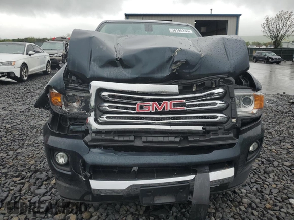 2018 GMC Canyon 4WD SLT z VIN 1GTG6DEN9J1104099, wystawiony jako Copart lot #56195235 z przebiegiem 115 308 mil mil oraz Szkoda całkowita • Salvage title. Historia ofert i sprzedaży dostępna na DreamBid. Obrazek 5.