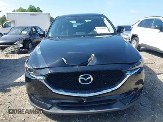 2017 Mazda CX-5 Touring z VIN JM3KFBCL0H0209458, wystawiony jako IAAI lot #42169599 z przebiegiem 93 287 mil mil oraz . Historia ofert i sprzedaży dostępna na DreamBid. Obrazek 12.