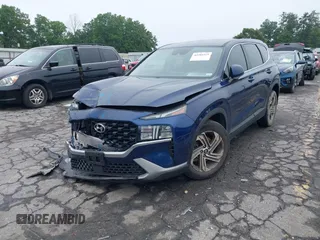 2021 Hyundai Santa Fe SE with VIN 5NMS14AJ2MH329146, listed as a IAAI auction lot 42342969 with 49,194 mi miles and . Bid and sale history available at DreamBid. Image 2.