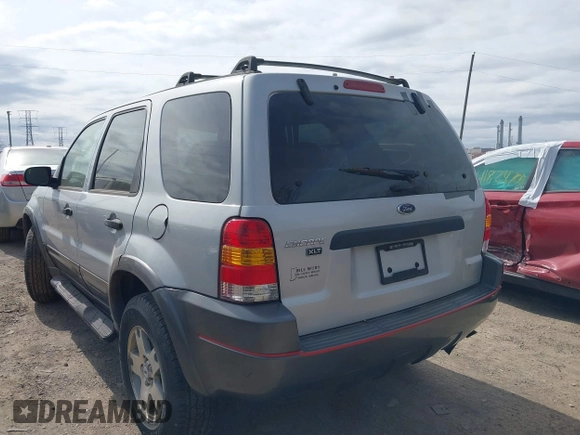 2003 Ford Escape XLT Popular 2 with VIN 1FMYU93163KC74842, listed as a IAAI auction lot 41828112 with 171,988 mi miles. Bid and sale history available at carsss.com. Image 3.