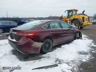 2016 Toyota Avalon Limited with VIN 4T1BK1EB6GU221765, listed as a IAAI auction lot 41264619 with 77,574 mi miles. Bid and sale history available at carsss.com. Image 4.