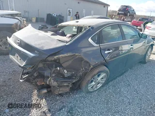 2013 Nissan Altima SV with VIN 1N4AL3AP2DC165065, listed as a IAAI auction lot 42040717 with 142,996 mi miles and . Bid and sale history available at carsss.com. Image 4.