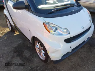 2009 Smart fortwo Pure z VIN WMEEJ31X99K292492, wystawiony jako IAAI lot #41029051 z przebiegiem 57 741 mil mil oraz . Historia ofert i sprzedaży dostępna na DreamBid. Obrazek 6.