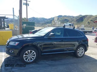 2014 Audi Q5 Premium z VIN WA1CFAFP0EA085858, wystawiony jako IAAI lot #41956522 z przebiegiem Nie podano mil oraz . Historia ofert i sprzedaży dostępna na DreamBid. Obrazek 13.