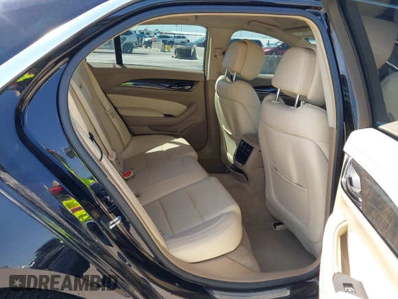 2014 Cadillac CTS Luxury RWD z VIN 1G6AR5SX3E0196348, wystawiony jako IAAI lot #42282732 z przebiegiem 130 956 mil mil oraz . Historia ofert i sprzedaży dostępna na DreamBid. Obrazek 8.