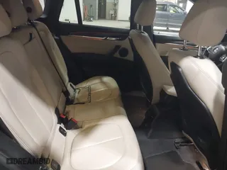 2016 BMW X1 xDrive28i with VIN WBXHT3C3XG5E47536, listed as a IAAI auction lot 41672144 with 97,932 mi miles. Bid and sale history available at carsss.com. Image 8.