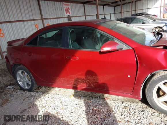 2009 Pontiac G6 1SB with VIN 1G2ZJ57KX94259078, listed as a IAAI auction lot 41223904 with 129,681 mi miles and . Bid and sale history available at DreamBid. Image 14.
