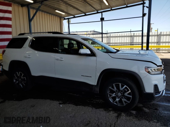 2023 GMC Acadia SLT with VIN 1GKKNML4XPZ188469, listed as a Copart auction lot 53061335 with 63,450 mi miles and Clean Title. Bid and sale history available at DreamBid. Image 4.