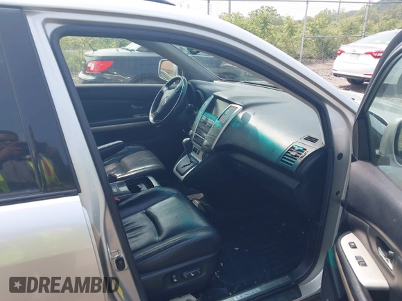 2006 Lexus RX 400h with VIN JTJHW31U460032959, listed as a IAAI auction lot 42382651 with 136,961 mi miles and . Bid and sale history available at DreamBid. Image 5.