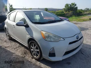 2012 Toyota Prius One z VIN JTDKDTB3XC1017487, wystawiony jako IAAI lot #42466661 z przebiegiem 195 876 mil mil oraz . Historia ofert i sprzedaży dostępna na DreamBid. Obrazek 1.