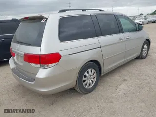 2008 Honda Odyssey EX-L with VIN 5FNRL38648B004011, listed as a IAAI auction lot 42042527 with 148,090 mi miles. Bid and sale history available at carsss.com. Image 4.