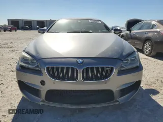 2014 BMW M6 z VIN WBS6C9C54ED467184, wystawiony jako Copart lot #80580904 z przebiegiem 88 878 mil mil oraz Czysty tytuł • Clean title. Historia ofert i sprzedaży dostępna na DreamBid. Obrazek 5.