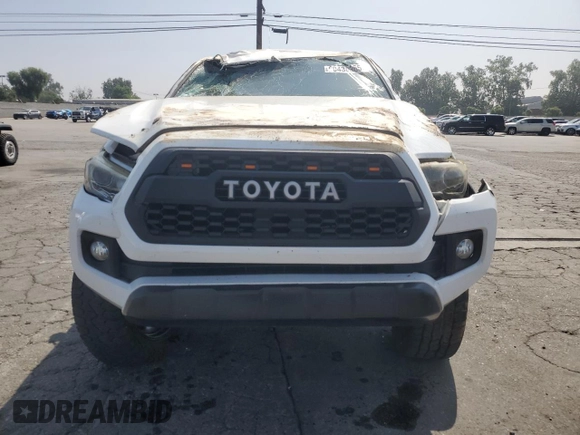 2017 Toyota Tacoma SR5 with VIN 3TMCZ5AN7HM065026, listed as a Copart auction lot 60438365 with 122,329 mi miles and Salvage title. Bid and sale history available at DreamBid. Image 5.