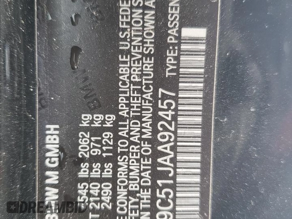 2018 BMW M4 with VIN WBS4Y9C51JAA92457, listed as a Copart auction lot 87014004 with 83,423 mi miles and Salvage Title. Bid and sale history available at carsss.com. Image 14.