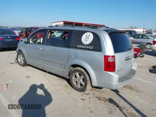 2010 Dodge Grand Caravan SXT with VIN 2D4RN5D17AR154594, listed as a IAAI auction lot 41751767 with Not Provided miles and . Bid and sale history available at DreamBid. Image 3.