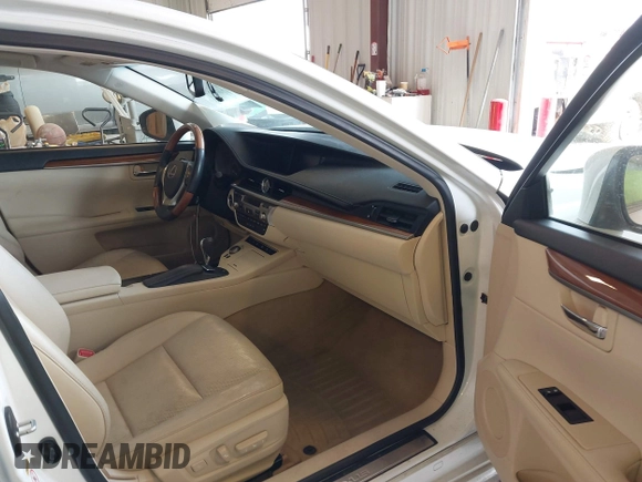 2014 Lexus ES 300h with VIN JTHBW1GG2E2067189, listed as a IAAI auction lot 42404843 with 182,798 mi miles and . Bid and sale history available at DreamBid. Image 5.