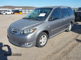 2005 Mazda MPV LX with VIN JM3LW28A850547486, listed as a IAAI auction lot 41138215 with 159,132 mi miles and . Bid and sale history available at carsss.com. Image 2.
