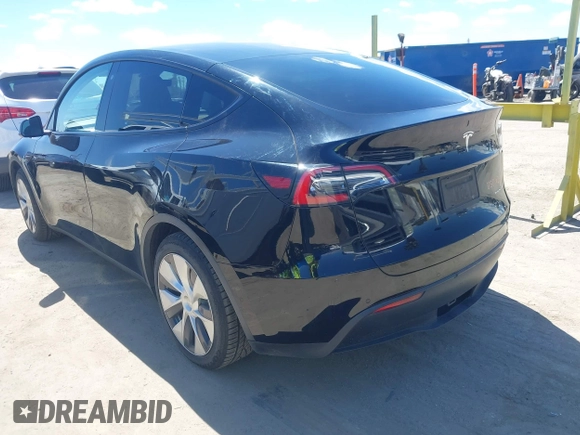 2020 Tesla Model Y Long Range with VIN 5YJYGDEE2LF059177, listed as a IAAI auction lot 41916260 with 66,190 mi miles and . Bid and sale history available at DreamBid. Image 3.