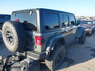 2021 Jeep Wrangler Unlimited Rubicon with VIN 1C4JJXFG3MW842686, listed as a IAAI auction lot 41517391 with 44,127 mi miles. Bid and sale history available at carsss.com. Image 4.
