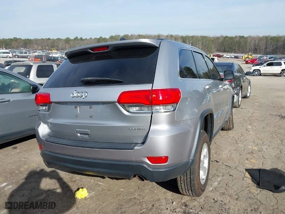 2014 Jeep Grand Cherokee Laredo with VIN 1C4RJFAG7EC270593, listed as a IAAI auction lot 41609865 with 184,145 mi miles. Bid and sale history available at carsss.com. Image 4.