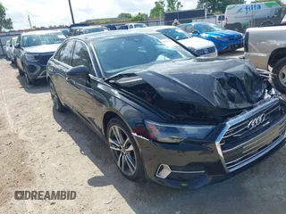 2023 Audi A6 Premium z VIN WAUD3BF2XPN048712, wystawiony jako IAAI lot #42127601 z przebiegiem 52 303 mil mil oraz . Historia ofert i sprzedaży dostępna na DreamBid. Obrazek 1.