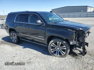 2015 GMC Yukon Denali with VIN 1GKS2CKJ5FR612147, listed as a Copart auction lot 49209525 with 127,262 mi miles and Salvage Title. Bid and sale history available at carsss.com. Image 4.