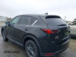 2020 Mazda CX-5 Touring with VIN JM3KFACM9L0770933, listed as a IAAI auction lot 41921464 with 75,997 mi miles. Bid and sale history available at carsss.com. Image 3.