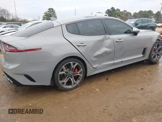 2018 Kia Stinger GT2 with VIN KNAE55LC7J6017223, listed as a IAAI auction lot 41356220 with 102,874 mi miles. Bid and sale history available at carsss.com. Image 4.
