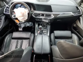 2021 BMW X5 M z VIN 5YMJU0C04M9F64315, wystawiony jako Copart lot #82029464 z przebiegiem Nie podano mil oraz Szkoda całkowita • Salvage title. Historia ofert i sprzedaży dostępna na DreamBid. Obrazek 8.