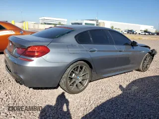 2014 BMW 6 Series 650i z VIN WBA6B2C57ED129034, wystawiony jako Copart lot #72774814 z przebiegiem 116 835 mil mil oraz Szkoda całkowita • Salvage title. Historia ofert i sprzedaży dostępna na DreamBid. Obrazek 3.