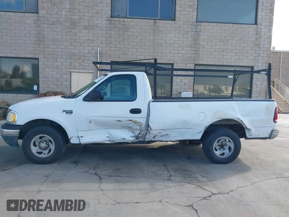 2000 Ford F-150 XL with VIN 1FTRF17WXYKA72880, listed as a IAAI auction lot 41989317 with 149,967 mi miles. Bid and sale history available at carsss.com. Image 14.