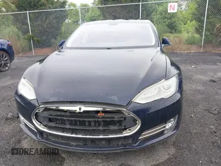 2014 Tesla Model S 60 with VIN 5YJSA1H19EFP32063, listed as a IAAI auction lot 42360872 with 103,495 mi miles and . Bid and sale history available at DreamBid. Image 6.
