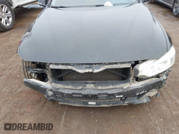 2014 BMW 4 Series 428i with VIN WBA3N7C50EF718339, listed as a IAAI auction lot 41403096 with 143,478 mi miles and . Bid and sale history available at carsss.com. Image 6.