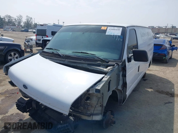 1999 Ford Econoline Cargo with VIN 1FTRE1421XHA35992, listed as a IAAI auction lot 42008448 with 293,689 mi miles and . Bid and sale history available at carsss.com. Image 2.