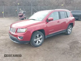2016 Jeep Compass High Altitude Edition with VIN 1C4NJDEB1GD729471, listed as a IAAI auction lot 41616976 with 124,385 mi miles. Bid and sale history available at carsss.com. Image 2.