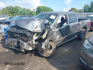 2022 Ford F-150 XL with VIN 1FTFW1E50NKE88686, listed as a IAAI auction lot 42155290 with 163,960 mi miles and . Bid and sale history available at DreamBid. Image 2.