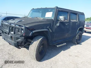 2003 Hummer H2 z VIN 5GRGN23UX3H140510, wystawiony jako IAAI lot #42325527 z przebiegiem 140 010 mil mil oraz . Historia ofert i sprzedaży dostępna na DreamBid. Obrazek 2.