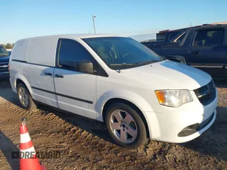 2014 Ram Cargo Van Tradesman with VIN 2C4JRGAGXER230933, listed as a IAAI auction lot 41166912 with 249,840 mi miles. Bid and sale history available at carsss.com. Image 1.