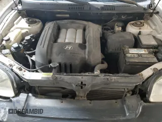 2004 Hyundai Santa Fe GLS with VIN KM8SC73D74U681615, listed as a Copart auction lot 76599554 with 163,530 mi miles and Salvage Title. Bid and sale history available at carsss.com. Image 12.