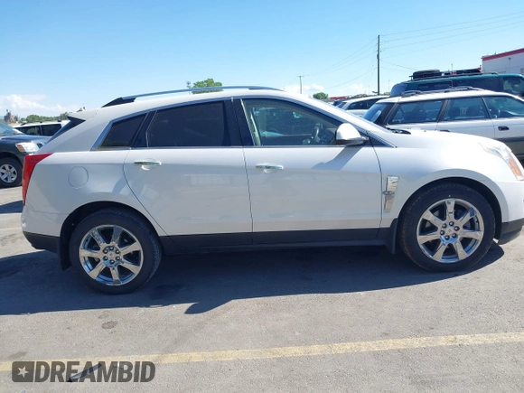 2011 Cadillac SRX Turbo Premium Collection with VIN 3GYFNKE68BS532056, listed as a IAAI auction lot 42447059 with 104,969 mi miles and . Bid and sale history available at DreamBid. Image 13.