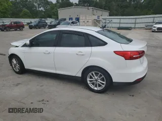 2015 Ford Focus SE with VIN 1FADP3F21FL246821, listed as a Copart auction lot 59732635 with 135,752 mi miles and Salvage title. Bid and sale history available at DreamBid. Image 2.