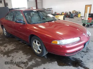 1998 Oldsmobile Intrigue GL z VIN 1G3WS52K6WF390219, wystawiony jako IAAI lot #42430980 z przebiegiem 209 781 mil mil oraz . Historia ofert i sprzedaży dostępna na DreamBid. Obrazek 1.