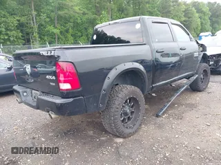 2014 Ram 1500 Express z VIN 1C6RR7KT9ES162080, wystawiony jako IAAI lot #42236759 z przebiegiem 147 216 mil mil oraz . Historia ofert i sprzedaży dostępna na DreamBid. Obrazek 4.