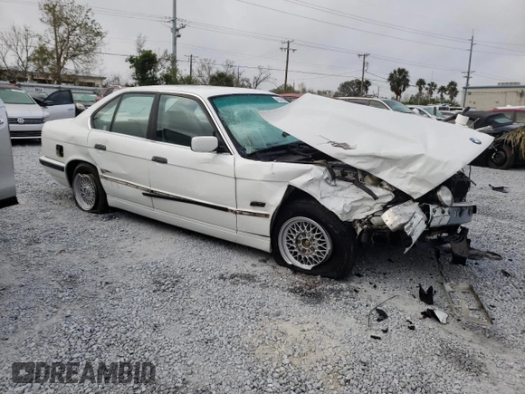 1995 BMW 5 Series 525i z VIN WBAHD6326SGK83552, wystawiony jako Copart lot #45245825 z przebiegiem 181 607 mil mil oraz Szkoda całkowita • Salvage title. Historia ofert i sprzedaży dostępna na DreamBid. Obrazek 4.