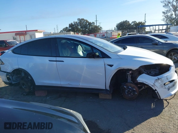 2022 Tesla Model X with VIN 7SAXCBE56NF329657, listed as a IAAI auction lot 41400629 with Not Provided miles and . Bid and sale history available at DreamBid. Image 14.