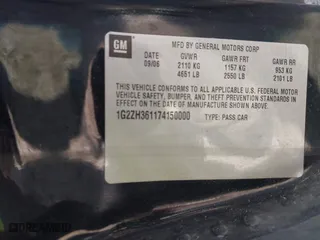 2007 Pontiac G6 GT with VIN 1G2ZH361174150000, listed as a IAAI auction lot 41365557 with 128,222 mi miles. Bid and sale history available at carsss.com. Image 9.
