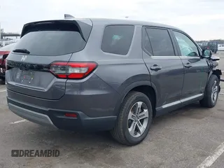 2024 Honda Pilot EX-L 7 Passenger with VIN 5FNYG1H59RB004311, listed as a IAAI auction lot 41307836 with 14,028 mi miles. Bid and sale history available at carsss.com. Image 4.