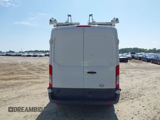 2015 Ford Transit Cargo z VIN 1FTNE2CM6FKA08103, wystawiony jako IAAI lot #42137844 z przebiegiem 224 687 mil mil oraz . Historia ofert i sprzedaży dostępna na DreamBid. Obrazek 16.