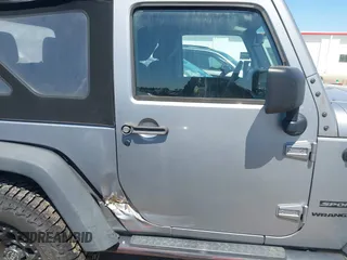 2015 Jeep Wrangler Sport with VIN 1C4AJWAG3FL696988, listed as a IAAI auction lot 41999036 with 79,064 mi miles. Bid and sale history available at carsss.com. Image 13.